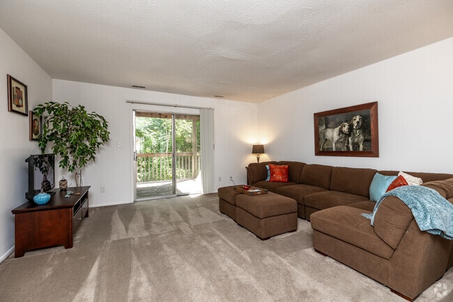 3BR, 2BA - 1,360-1,470SF - Living Room - Normandy Terrace Apartments