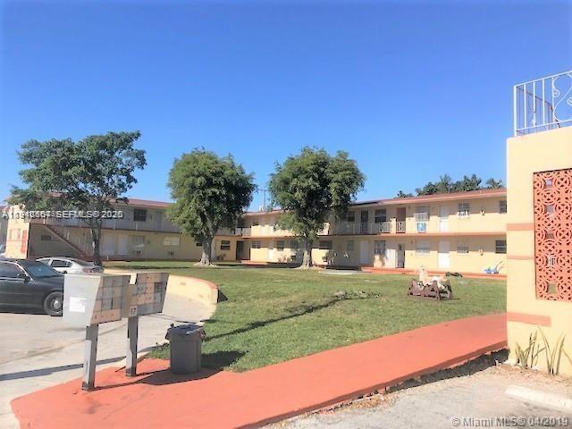 Building Photo - 2441 NW 13th St Unit 71