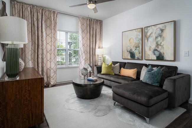 Spacious Living Rooms with Ceiling Fans - The Coleman Canal Winchester Apartments