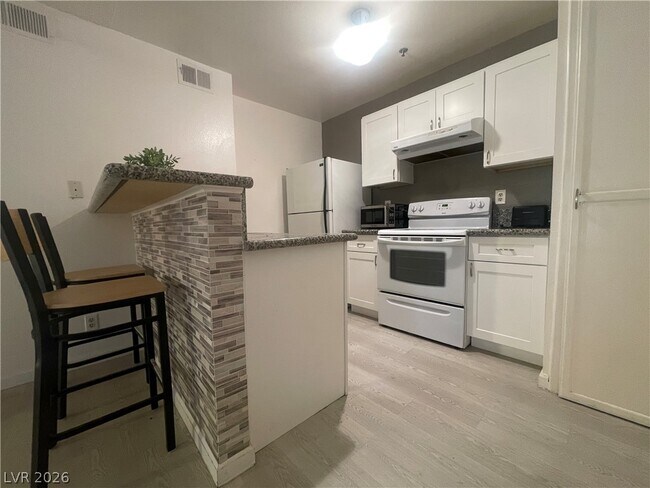 1361 E University Ave. Unit 105