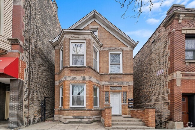 Building Photo - 2420 S Oakley Ave Rental