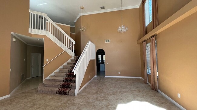 Photo - Spacious 4/3.5 Pool Home with Water View & 3-Car Garage in Lee Vista Area (close to Lake Nona)