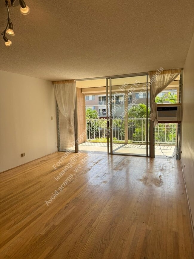 Building Photo - Pet Friendly 2-Bedroom With in Unit 214
