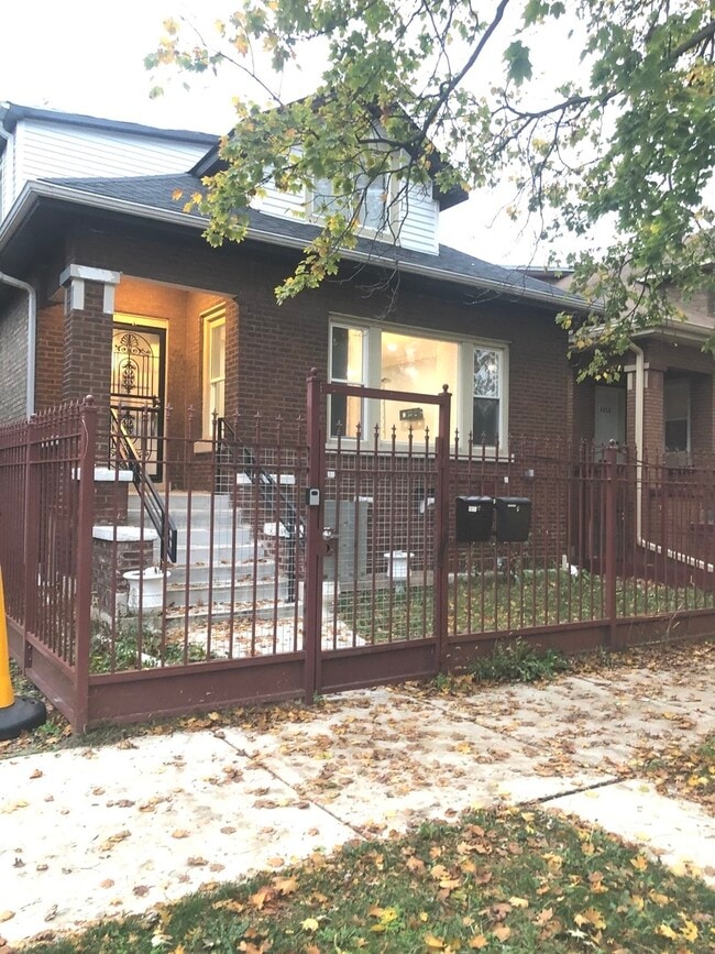 Building Photo - 4858 W Concord Pl Unit 1