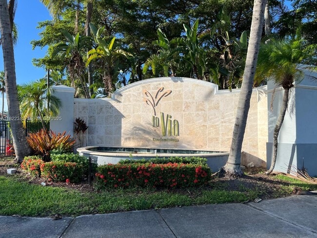 Building Photo - 9645 NW 1st Ct Unit 1-209