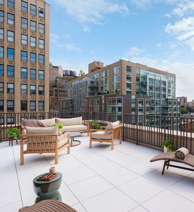 Welcome to Mabel, where urban living meets rooftop tranquility. Enjoy stunning city views from your private outdoor oasis. This modern space offers stylish amenities and a vibrant community. Schedule your tour today and elevate your lifestyle! - Mabel Chelsea