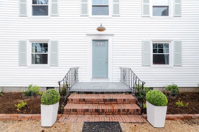 Building Photo - 7605 Atlantic Ave Unit A