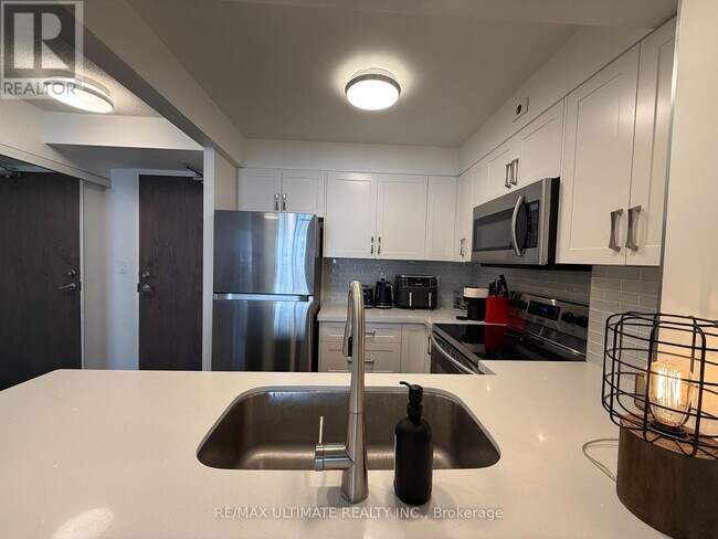 Photo - 1765 Queen St E Unit 312