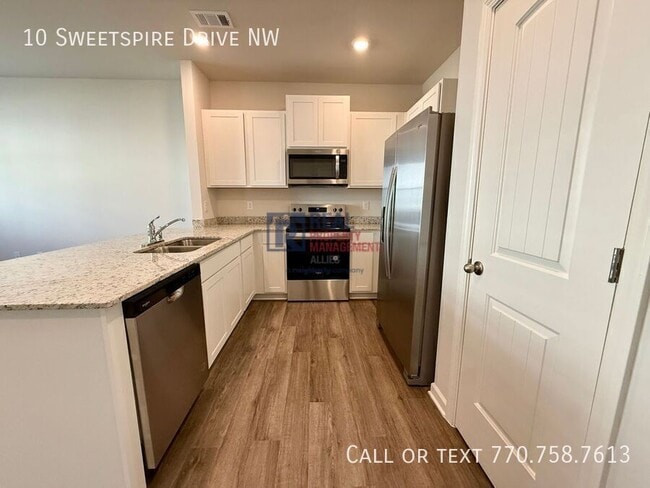 10 Sweetspire Dr NW