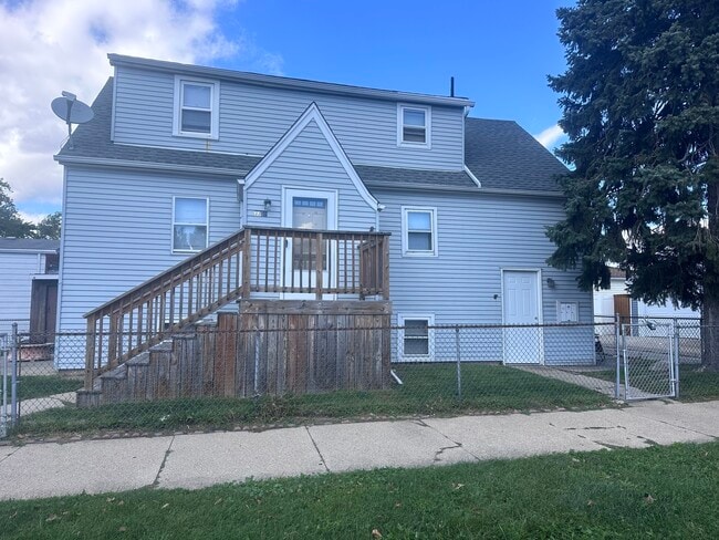 Building Photo - 3301 N Ozanam Ave Unit G