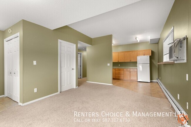 Photo - Main Floor 2 bedroom Unit With Onsite laundry, BONUS INCENTIVE
