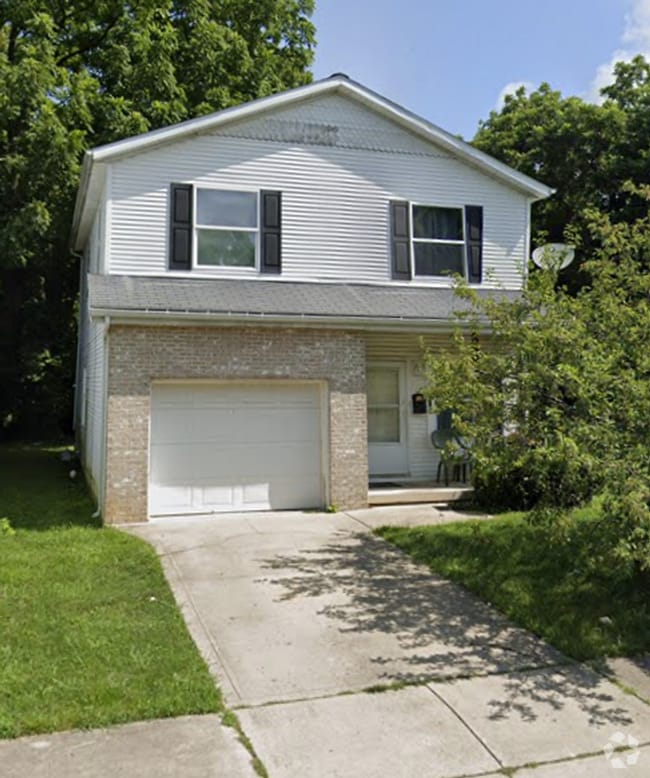 Building Photo - For Rent: Four-Bedroom, Two-Bathroom Avail... Rental