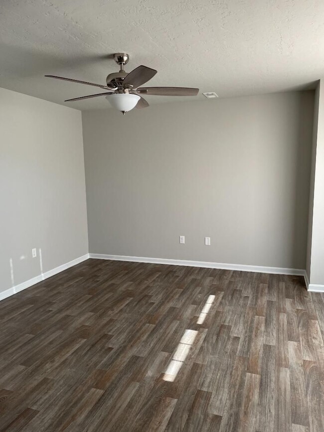 Photo - Modern Kitchen • Walk-In Closet • Private Primary Suite