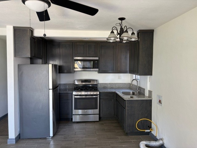kitchen with appliances - 920 E 91st St Unit 920