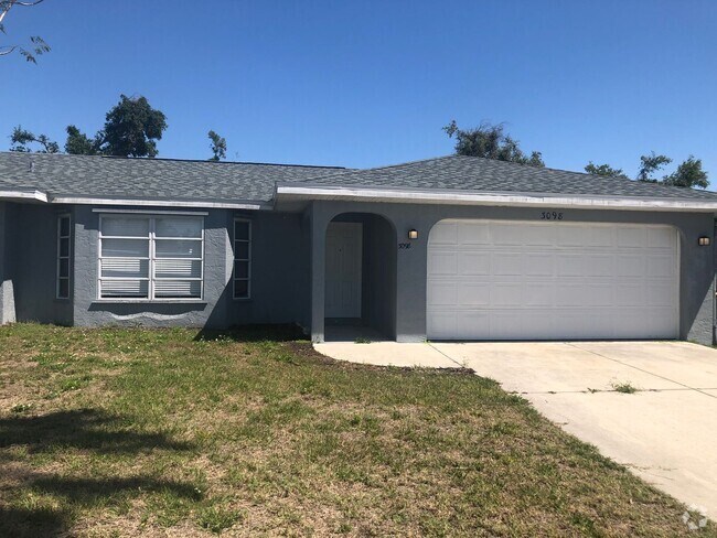 Building Photo - Spacious & Stylish 4-Bedroom Home – Prime ...
