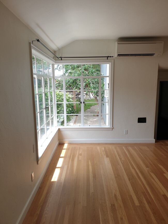 Large windows in living room - 2567 Land Park Dr Townhome
