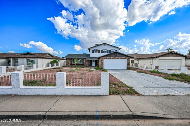 Building Photo - 5761 W Cholla St Rental