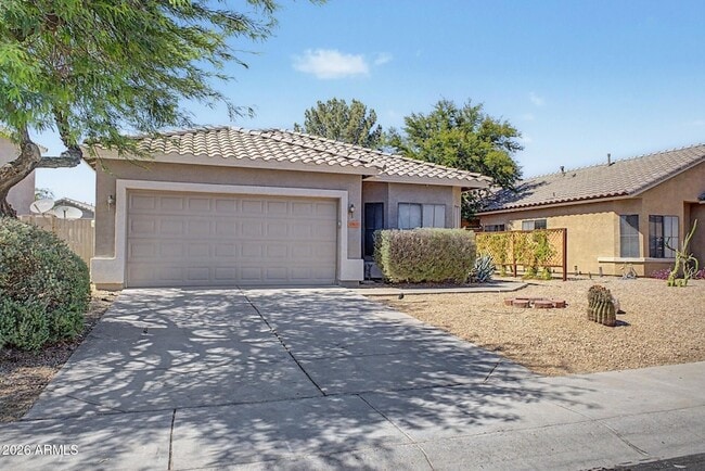 Building Photo - 8868 W Laurel Ln