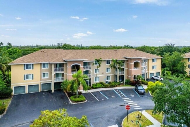 Building Photo - 6492 Emerald Dunes Dr Unit 208