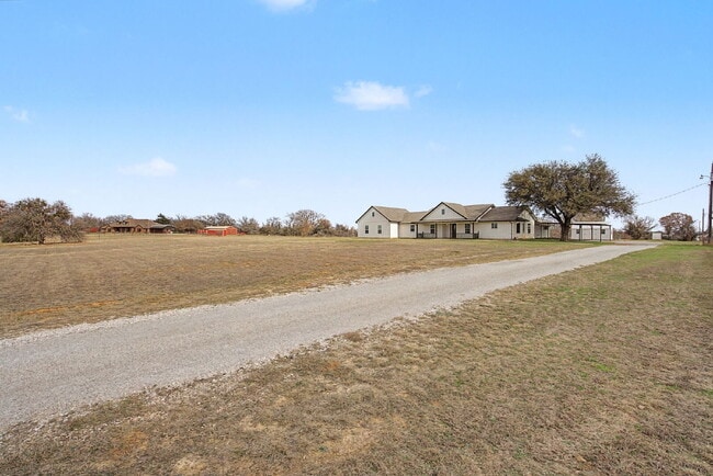 Photo - “4-Bedroom, 3-Bath Farmhouse Charm Meets Modern Luxury on a Serene 5-Acre Lot!”