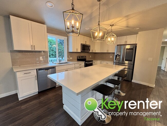 Photo - Split level 3 Bed 2 Bath Upstairs Unit with Modern Upgrades Close to JBLM!