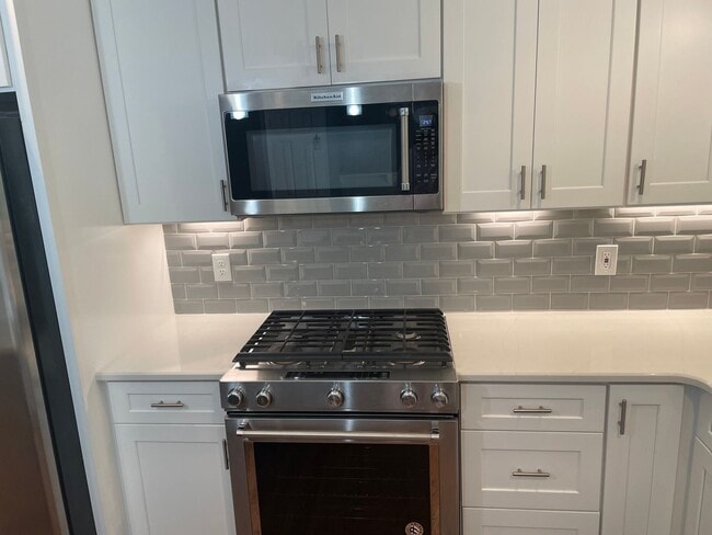 Photo - Coming Soon! 4 BR/2BA | Newly Renovated Single Family Home | 2-Car Garage Parking | Lots of storage!