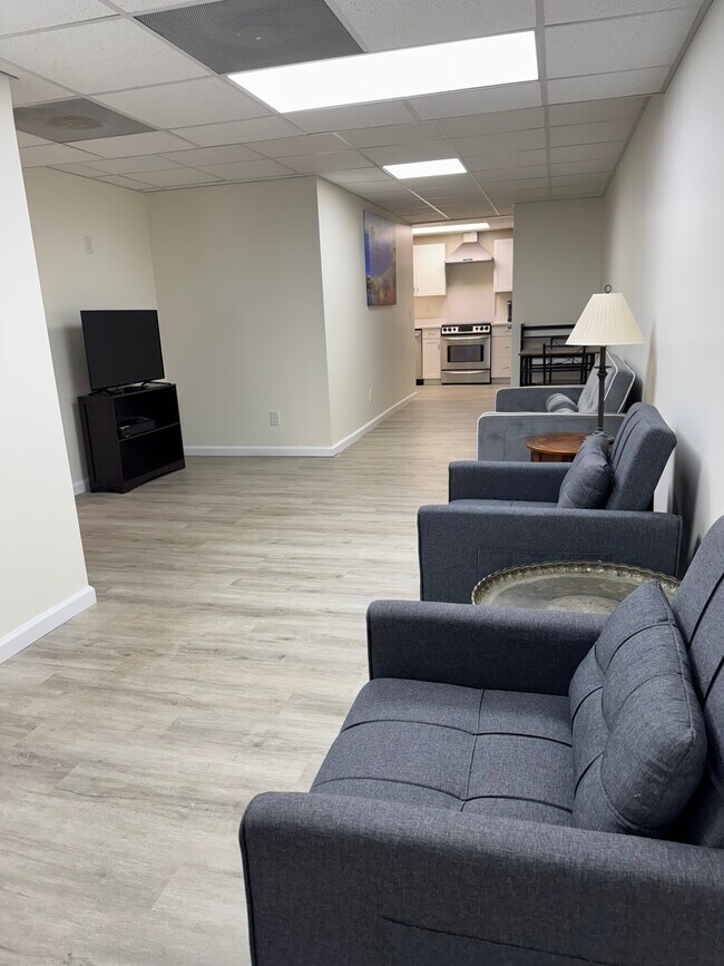 Living room and dining - 4615 Forest Pl Unit Basement Apartment