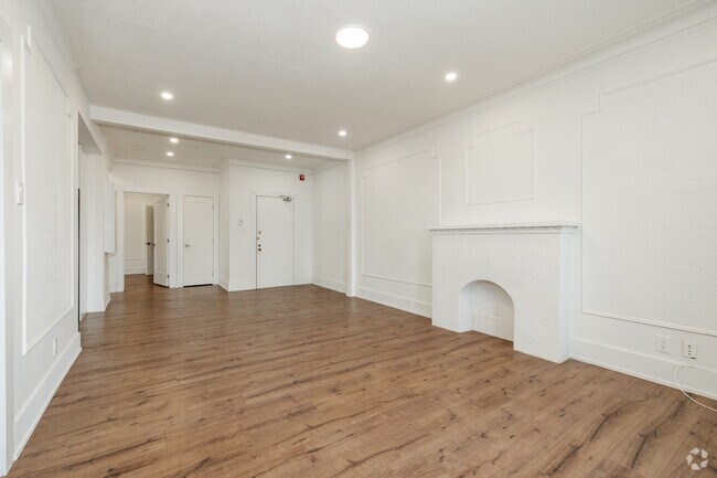 2BR, 1BA - 1250SF - Living Room - Plaza Court