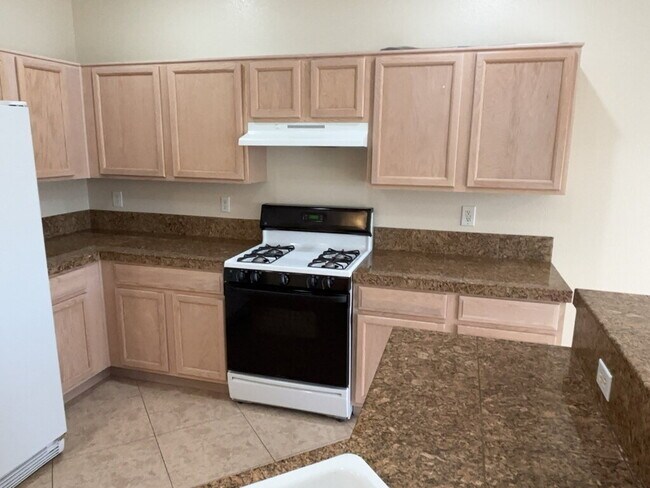 Photo - This beautiful two-story home is located in a gated community.