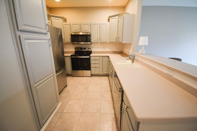 Photo - Spacious 2 Bed, 2 Bath Townhome with Attached Garage Available Now!