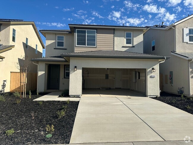 Building Photo - Newly built Woodside home located in Huckl...