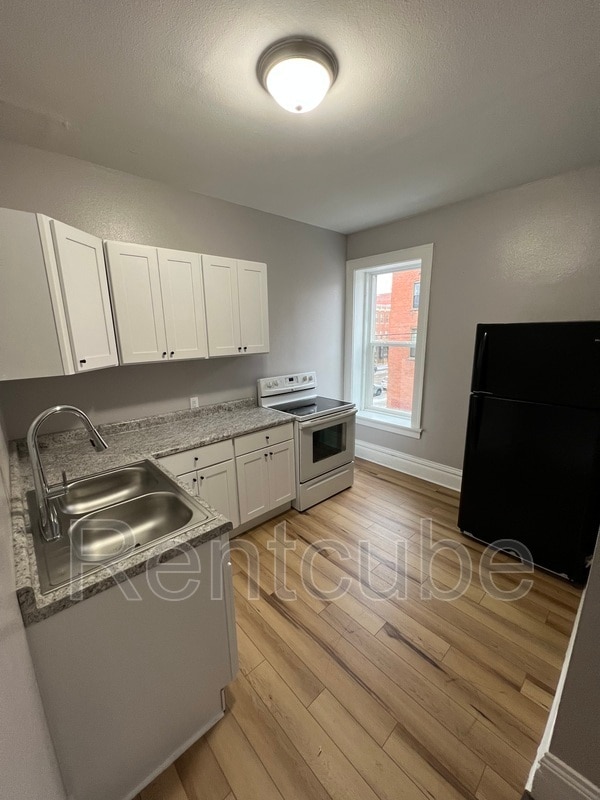 Building Photo - 243 W 11th St Unit 1 Rental