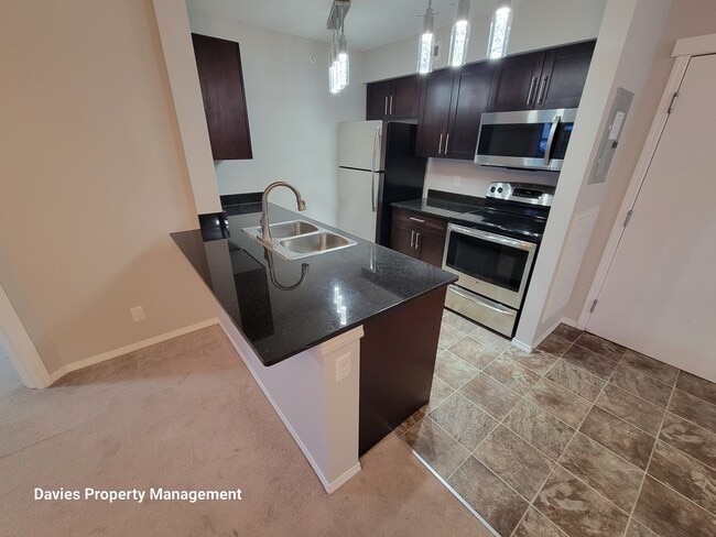 Photo - 12025-12022 22 Ave SW