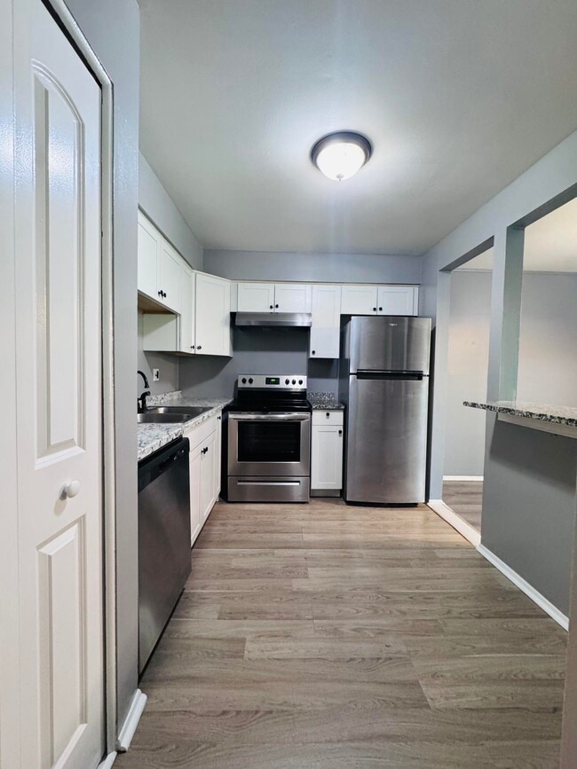 Building Photo - 7640 Woodview St Unit 1