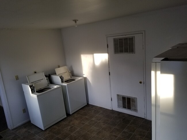 Coin operated washers - 12 Columbia St