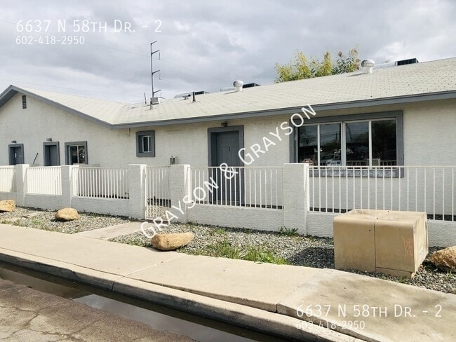 Building Photo - 6637 N 58th Dr Unit 2