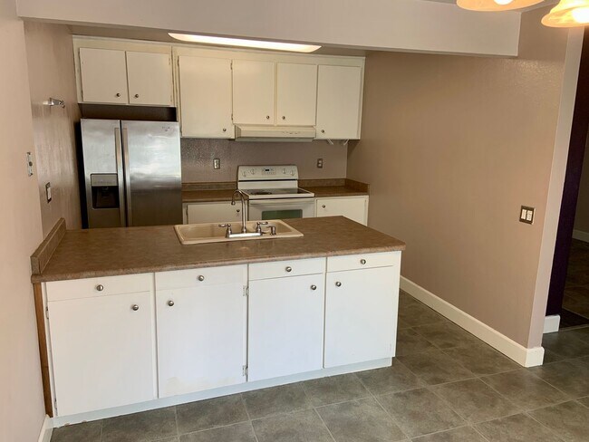 Photo - 2 Bed/ 1.5 Bath Condo with 2 car Garage