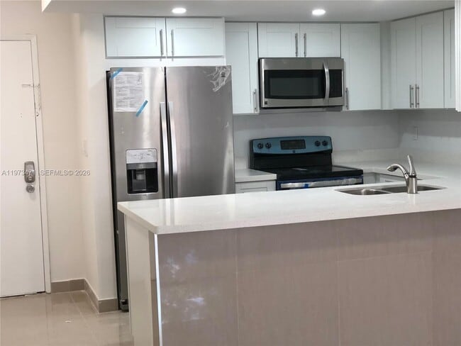 Building Photo - 8883 Fontainebleau Blvd Unit 101-A