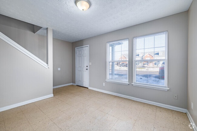 2 habitaciones, 2 baños - 900 pies cuadrados - Sala de estar - Meadow Creek Townhomes