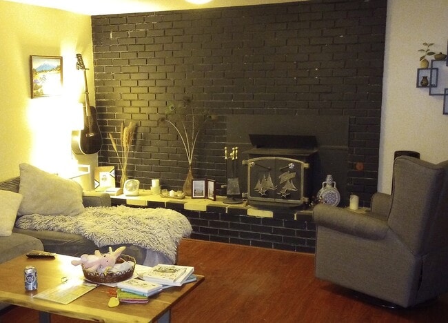 Fireplace in large living room - 2050 SW Pheasant Dr Unit Daylight basement apt