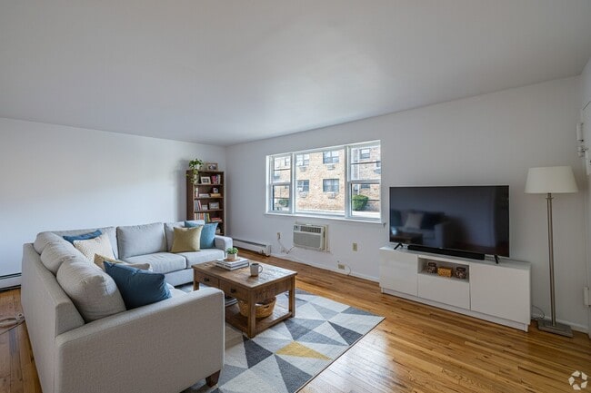 1 BR, 1 BA - 786SF - Living Room - Virtually Staged