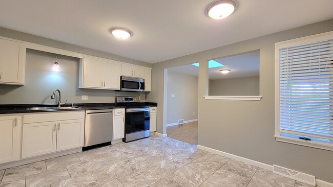 Photo - 231 Losson Rd Townhome