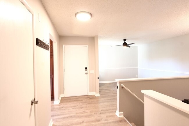 Photo - Spacious 3-Bedroom Condo with Finished Basement & Private Fenced Yard!