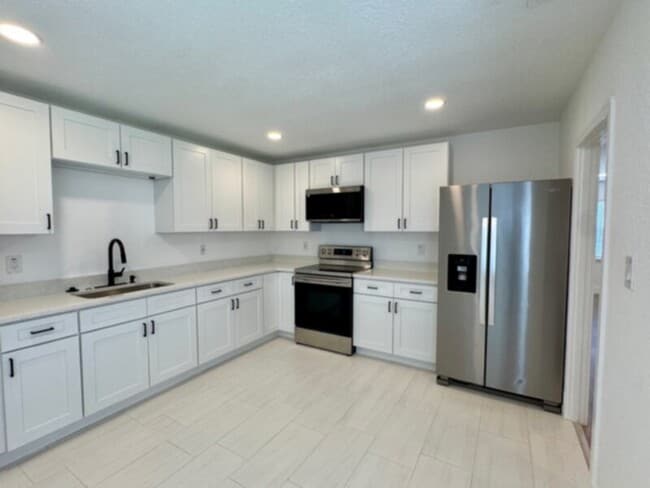 Photo - Completely Renovated 3 Bedroom Triplex wit...