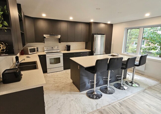 Photo - 2698 Chem. Bedford Unit ID1061557P