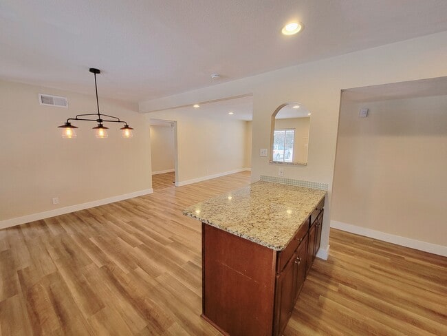 View of dining/living from kitchen island - 1170 Racine Street Unit Whole House