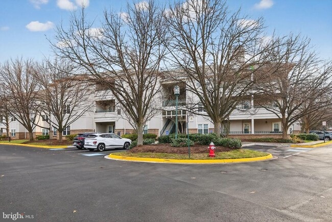 Building Photo - 12016 Taliesin Pl Unit 26