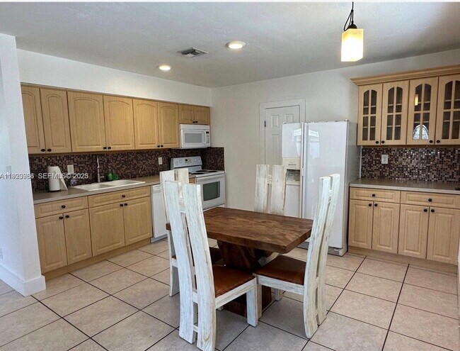 Photo - Southeast 4th Street, Dania Beach, FL 33004 - 3 BR 2 BA single-family home