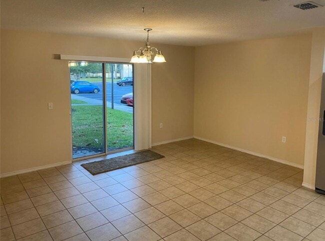 Photo - 3 BR/2.5BA | Newly Renovated Single Family Home | Private Rear Patio | Community Pool | In Compas...