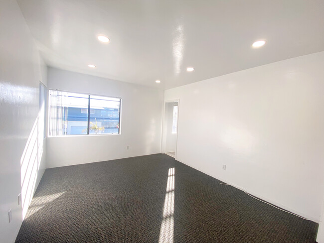Upgraded living room - 5819 E Ocean Blvd Apartments Unit 5819 E. Ocean Blvd.